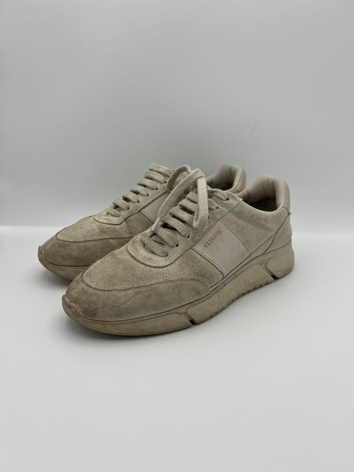 Axel Arigato Genesis Vintage Runner avant nettoyage dans notre atelier