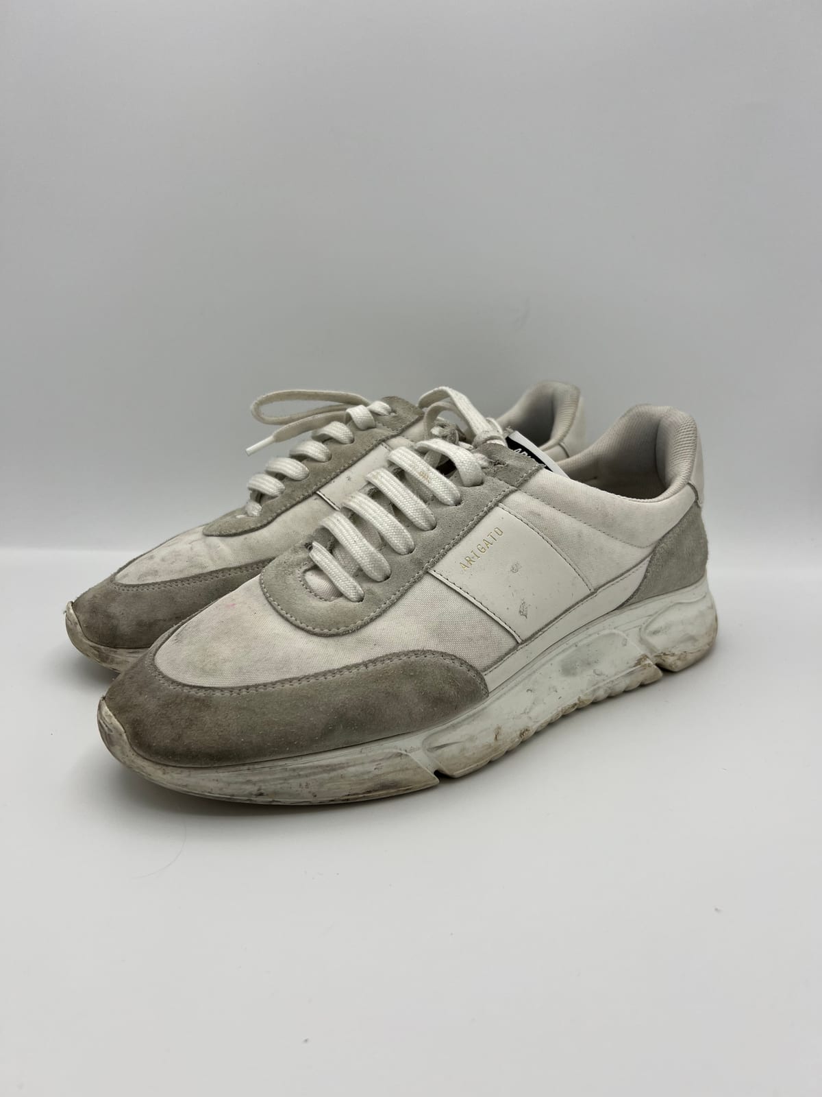 Axel Arigato Genesis Vintage Runner avant nettoyage dans notre atelier